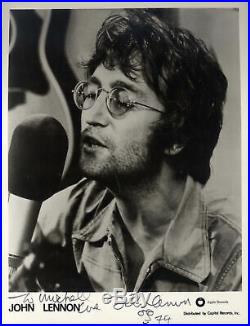 BEATLES SINGER John Lennon autograph, signed photo framed