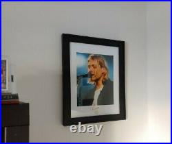Framed photo and paper signed by Nirvana Kurt Cobain