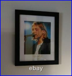 Framed photo and paper signed by Nirvana Kurt Cobain