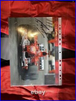 Michael Schumacher Signed Photo with racing suit and backdrop for framing COA