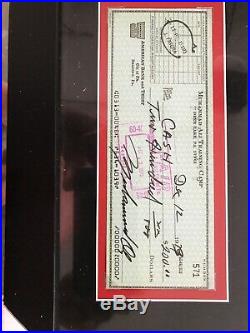 Muhammad Ali signed 16x14 Frame With The Check (Not authentic)