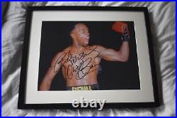 Nigel Benn signed and framed picture with exact photo evidence of signing