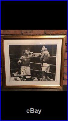 Rare Muhammed Ali and Joe Frazier signed large framed picture. Certified