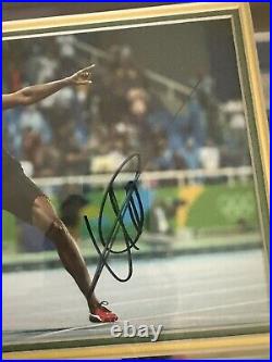 Usain Bolt Framed and Signed photo with AFTAL CoA